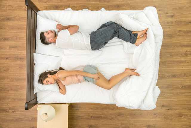 Mattress Recommendations by Sleep Position Person sleeping comfortably on their side