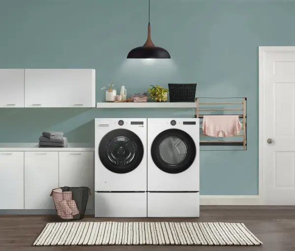 LG WM5500HWA washer and matching dryer in a laundry room 