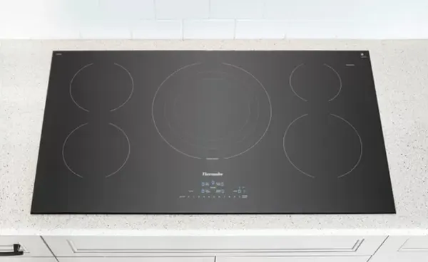 Credit: Thermador Overhead look at the Thermador Masterpiece CIT365YB cooktop