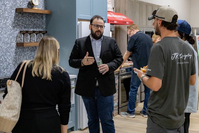 View of a Gerhard's employee discussing with two customers in the King of Prussia showroom