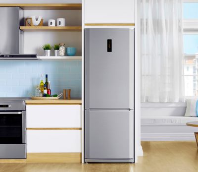 A stainless steel bottom freezer refrigerator in a modern kitchen 