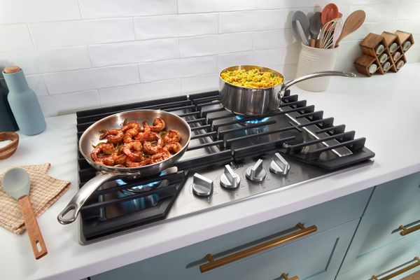 Shrimp and rice cooking on the Whirlpool WCGK5036PS cooktop