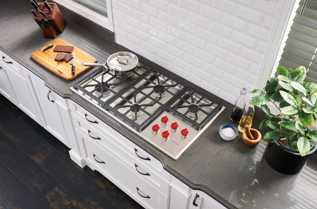 View of a Wolf gas cooktop in a modern kitchne