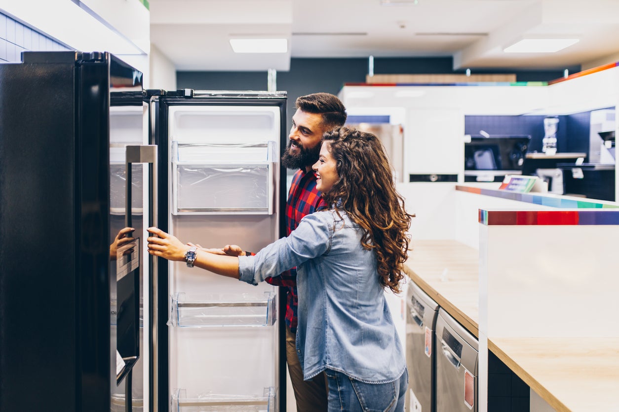 Refrigerator Shopping Couple Shopping for a Refrigerator