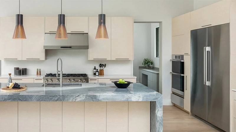 A kitchen featuring Dacor stainless steel appliances