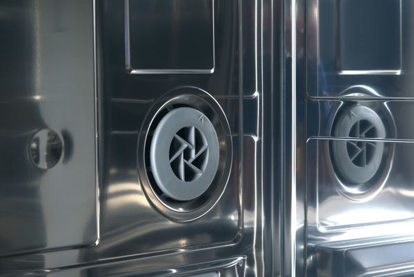 A close-up of a dishwasher fan 