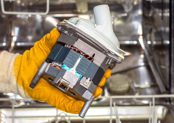 A close-up of a dishwasher part