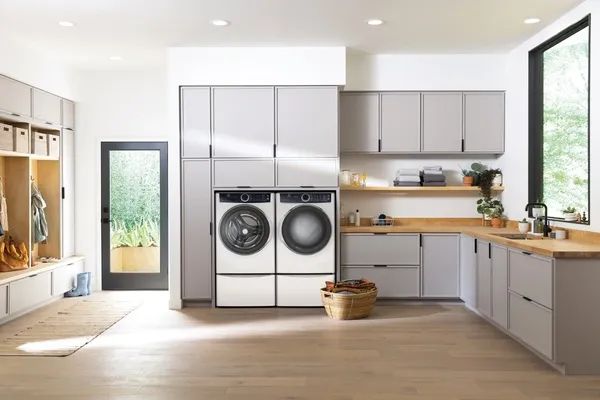 The Electrolux ELFW7537AW washer and dryer in a laundry room 