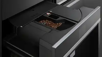 A close-up of the Fisher & Paykel Series 9 EB30PSX1 coffee machine grinder