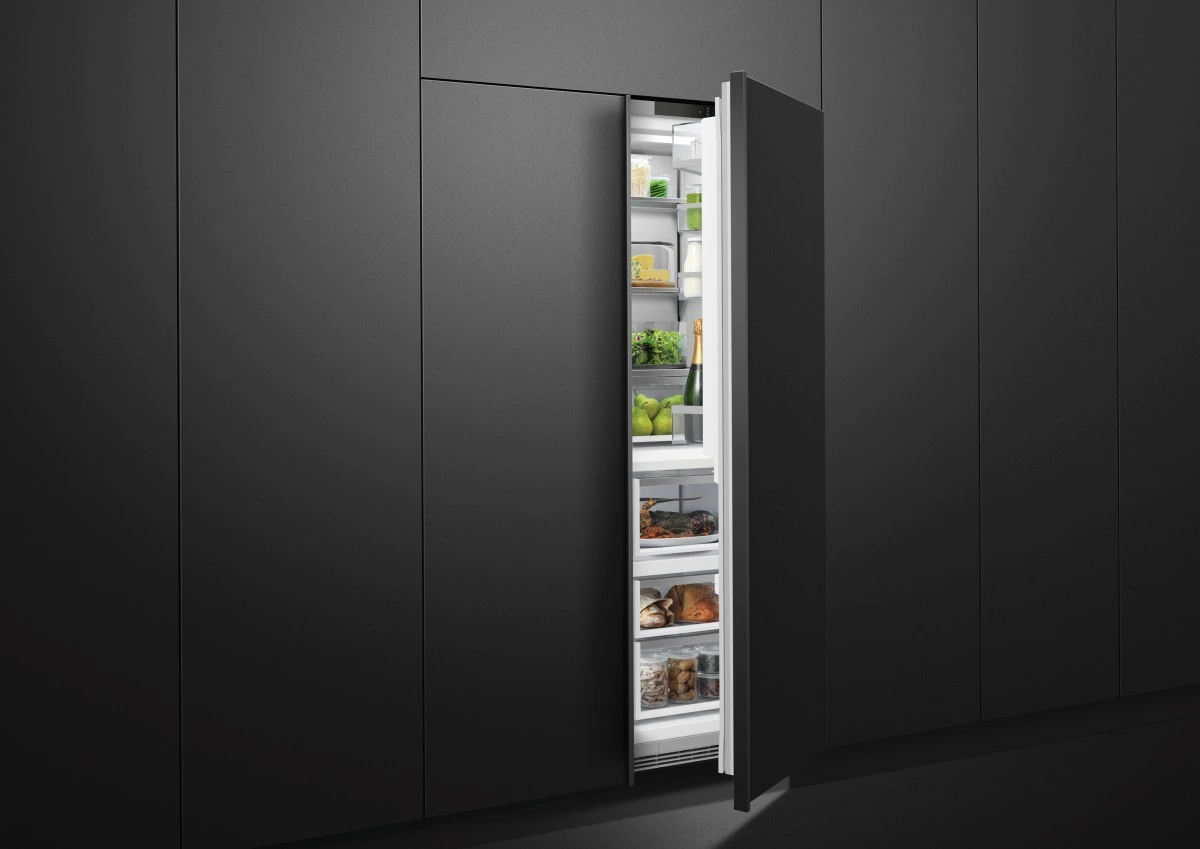 An open Fisher & Paykel Series 9 RS2474S3RH1 refrigerator in a custom black finish