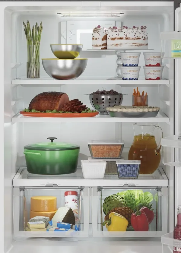 Various food items stored inside the GE GBE21DYKFS refrigerator interior