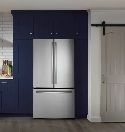 The GE GNE27JYMFS French door refrigerator in a kitchen