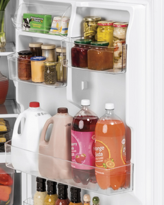 A close-up of items inside the GE GTE19JSNRSS refrigerator door bins