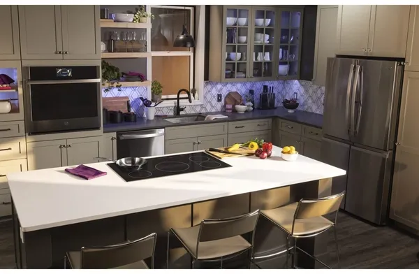 A kitchen featuring GE Profile appliances
