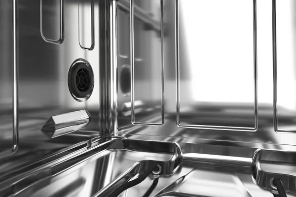 A close-up of the KitchenAid KDFE204KPS dishwasher tub