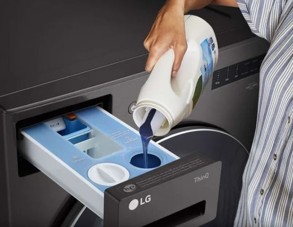 A close-up of the eZDispense feature on an LG front load washer