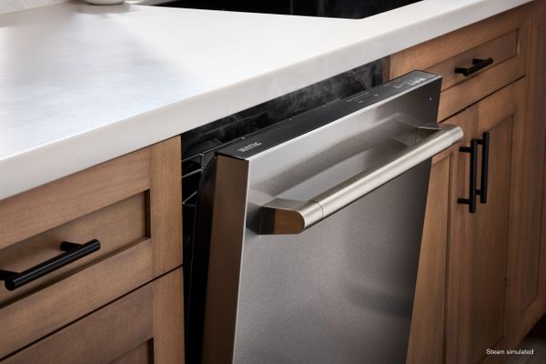 A close-up of an open Maytag MDTS7024SZ dishwasher