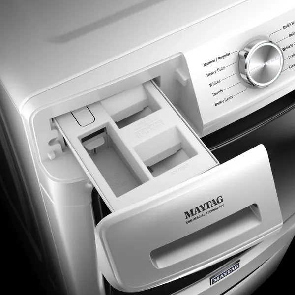 A close-up of the Maytag MHW5630HW detergent dispenser