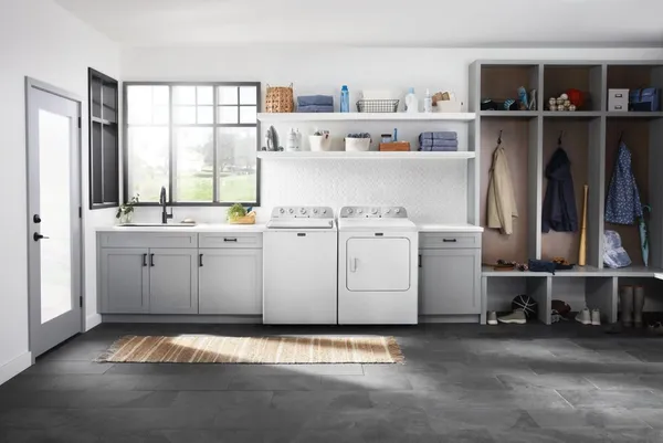 Credit: Maytag The Maytag MVW5035MW and MGD5030MW laundry pair in a laundry room