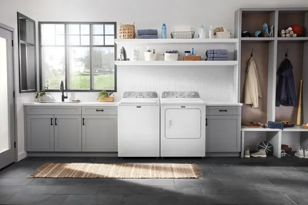 The Maytag MVW5035MW washer and dryer in a laundry room
