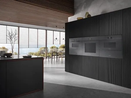 The Miele DGC 7870X GG oven and matching ovens in a wall 