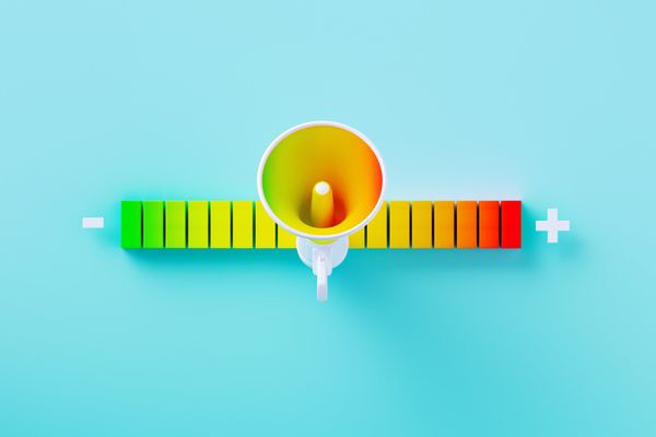 A graphic of a megaphone atop a noise scale and a blue background 