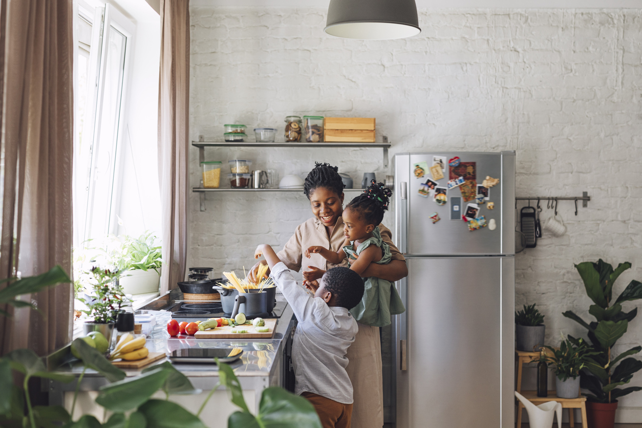 Family cooking in kitchen 