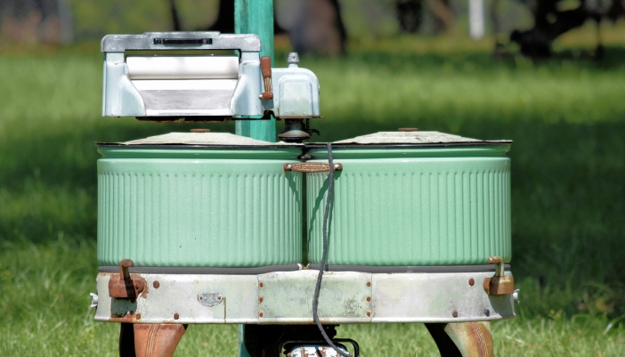 App_Laundry-Tech-Innovations_2.jpg Closeup of a vintage, electric washing machine