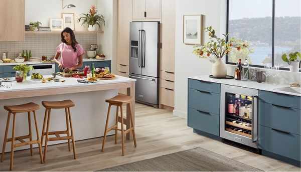 Built in refrigerator seamlessly integrated into custom kitchen cabinetry