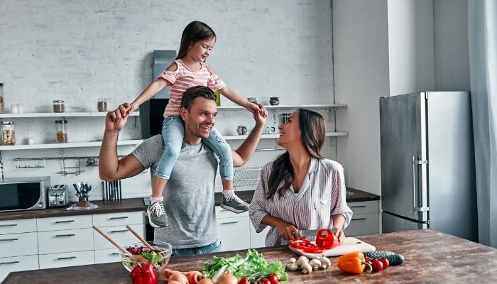 App_Places-Odors-Lurk_5.jpg Happy family cooking in kitchen