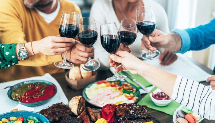 App_Meat-Thermometer_5.jpg Group of friends celebrating lunch together with cooked meat as the meal