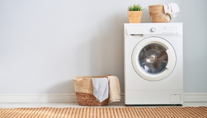 A washer-dryer combo with baskets on top