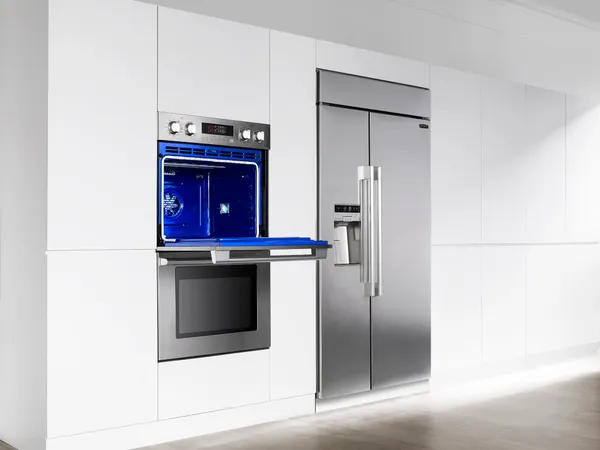 The Signature Kitchen Suite UPWD3034ST oven and matching refrigerator