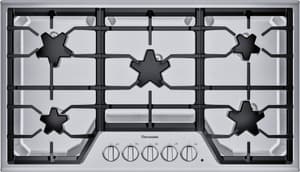 iron grate covering gas cooktop