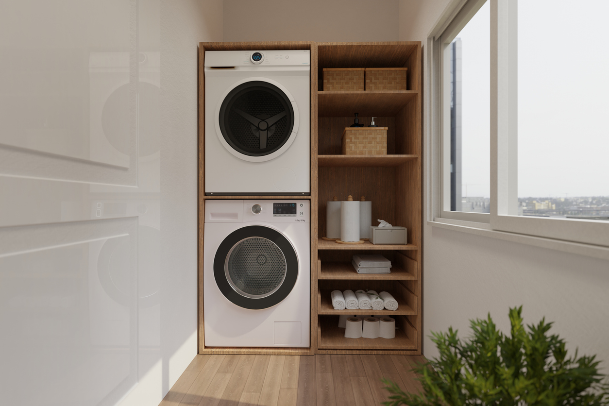 Valeria Titarenco A stacked washer and dryer in a laundry room