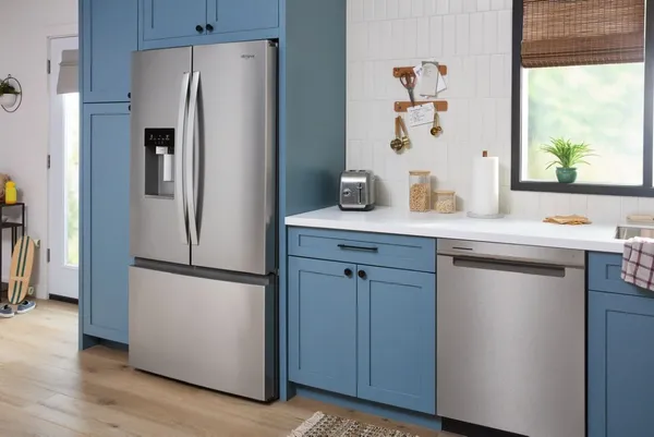 The Whirlpool WRFC7036RZ refrigerator and matching dishwasher in a kitchen 