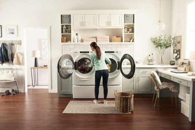 Woman Loading a Front Load Washer