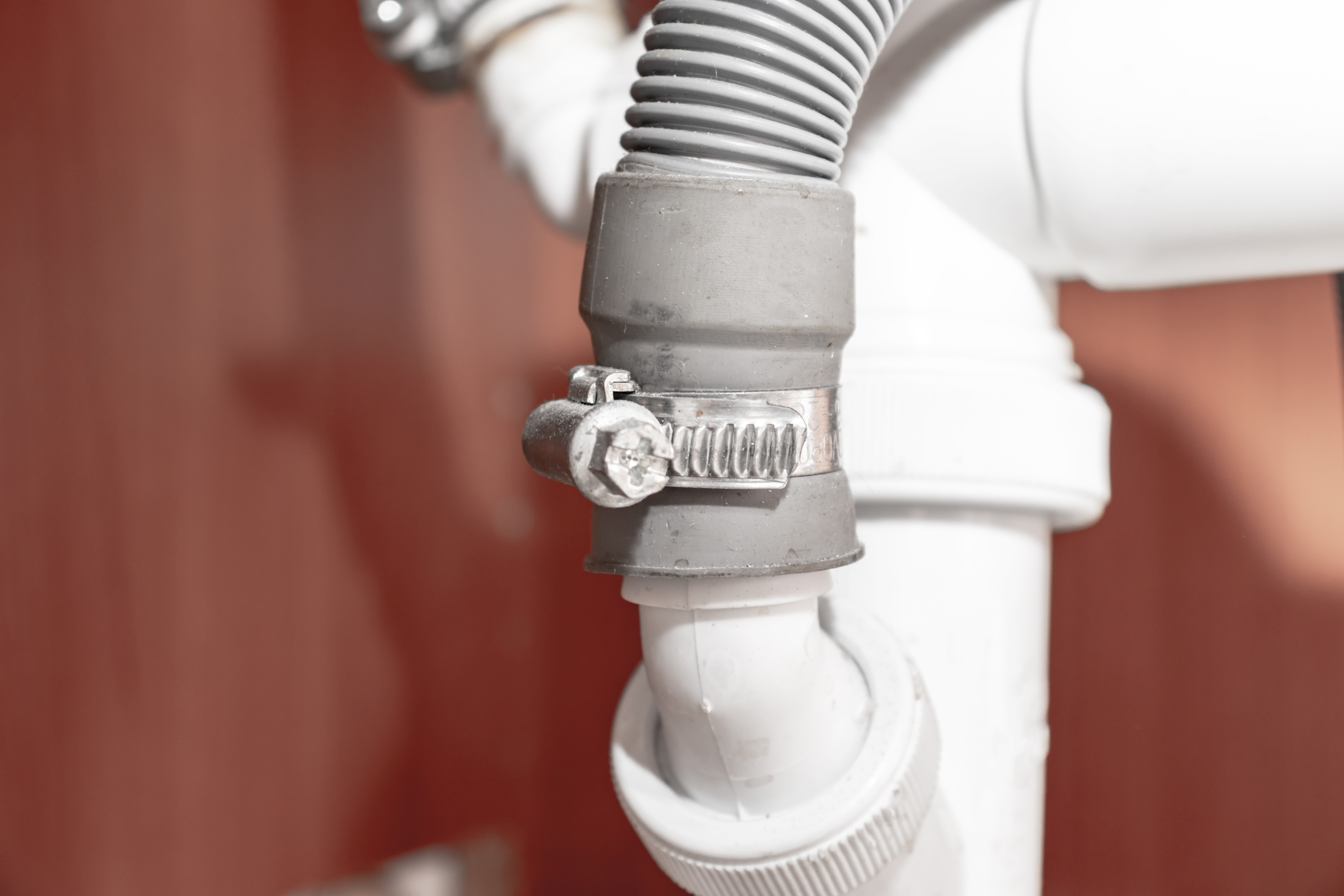 Close up of a dishwasher hose 
