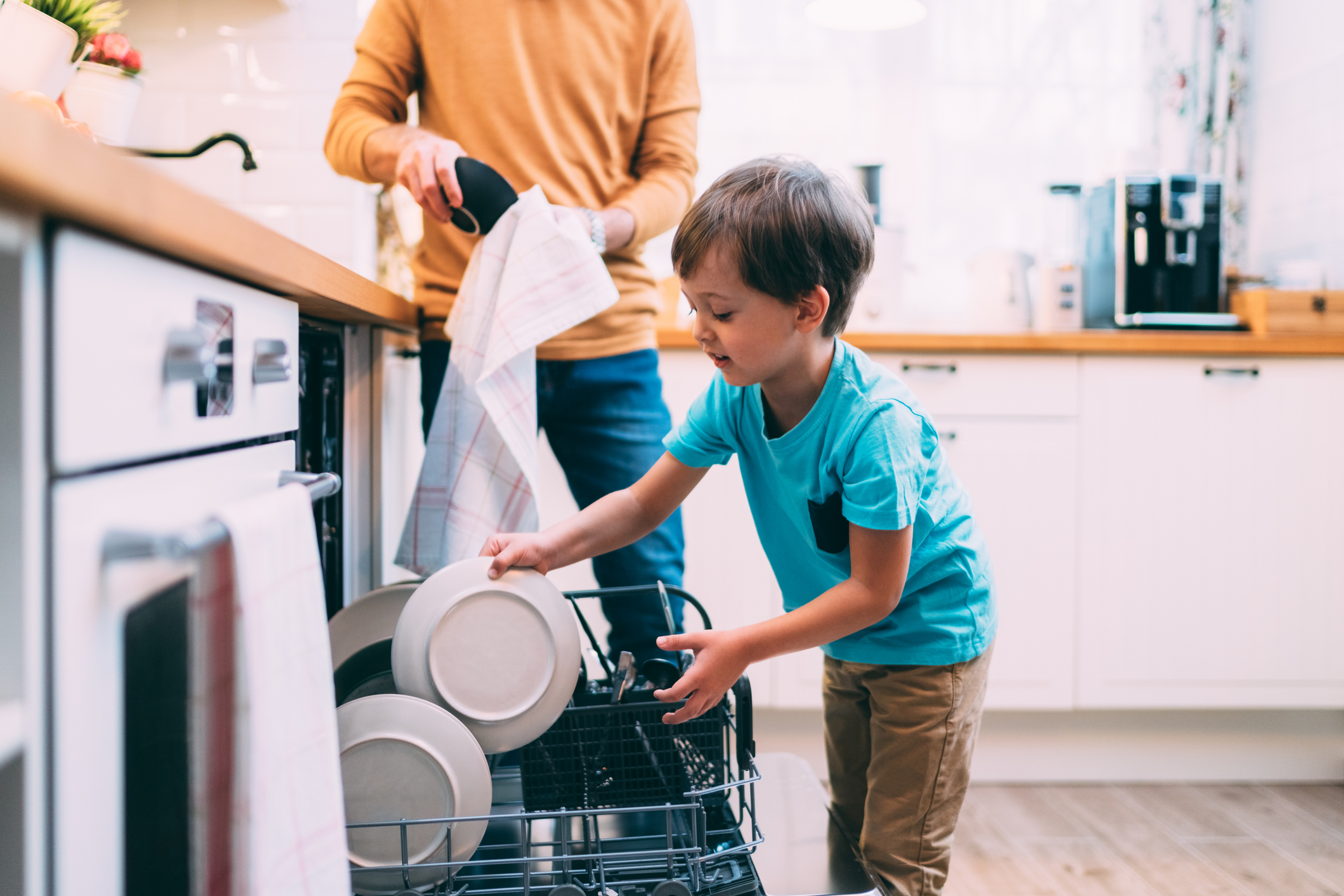 martin-dm boy helping load the dishwasher