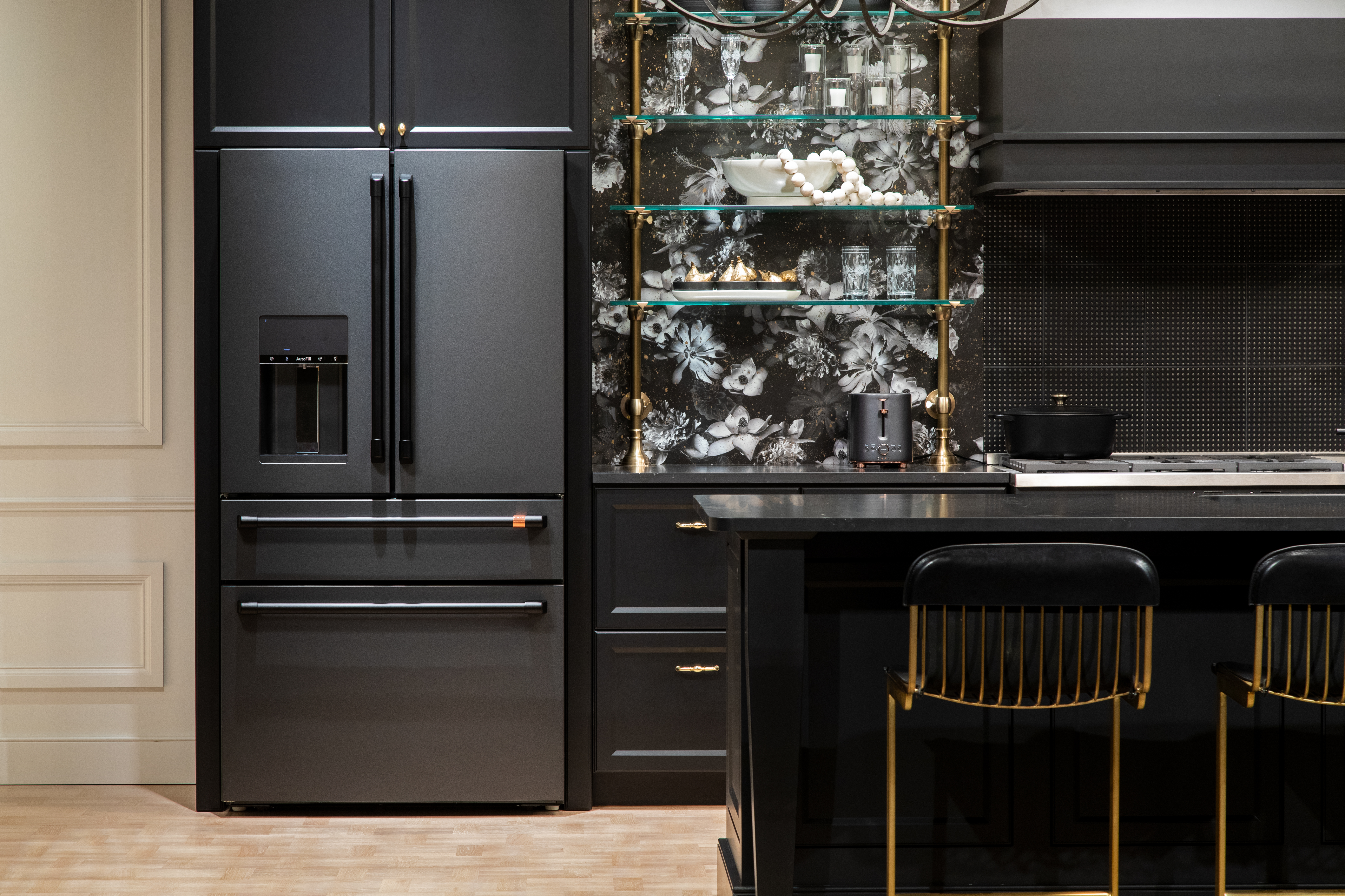 iStock Credit: Café Images black café fridge in modern kitchen