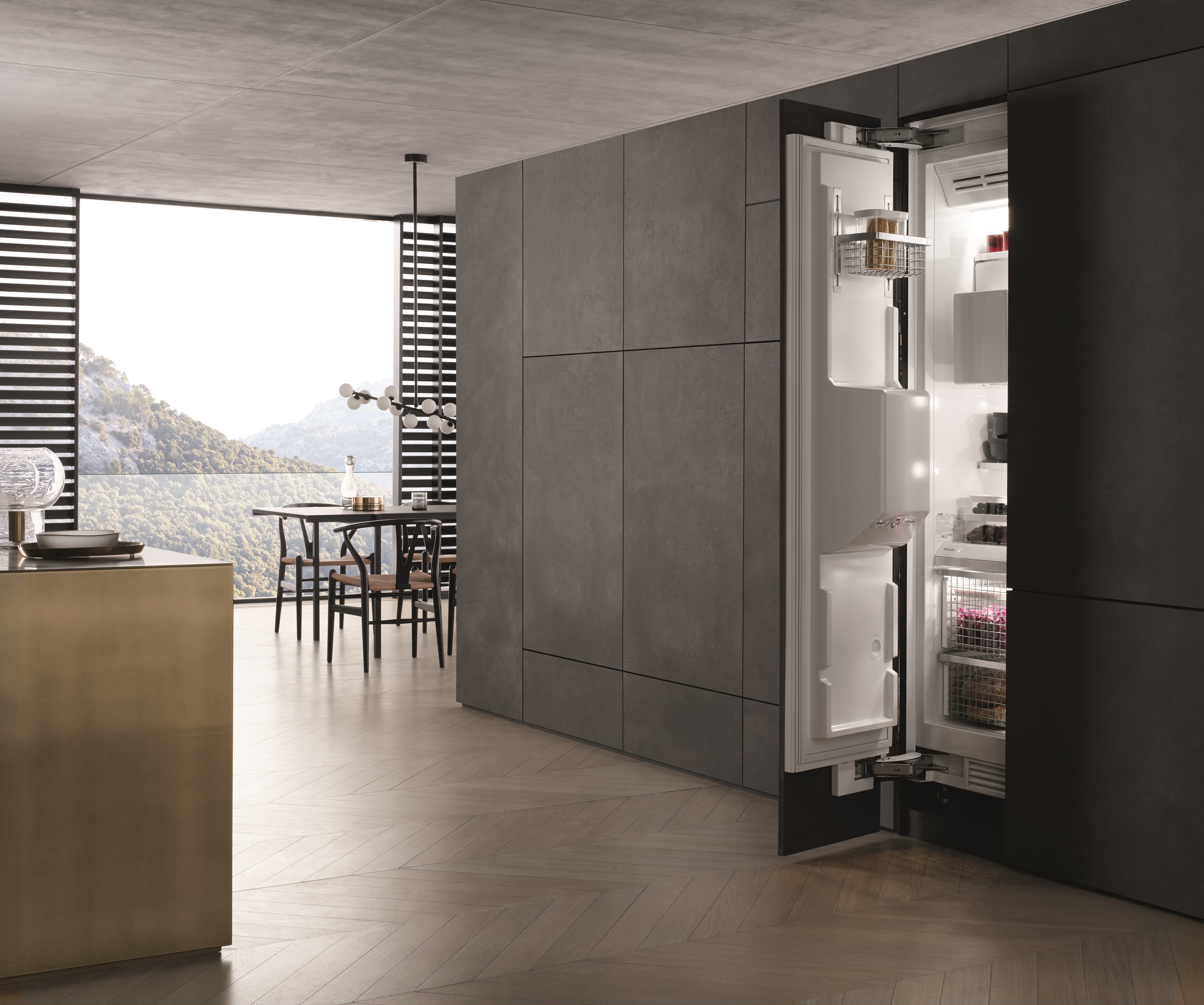 iStock Credit: imaginima A black modern luxury kitchen with wood accents