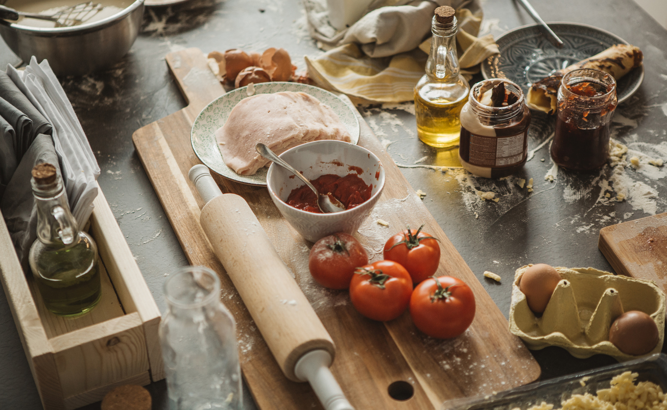 iStock Credit: svetikd a very messy kitchen table that’s been cooked at