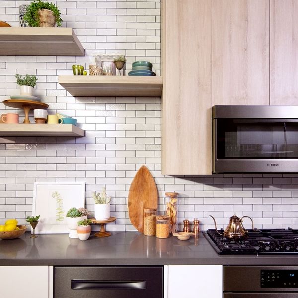 A black Bosch dishwasher in a kitchen