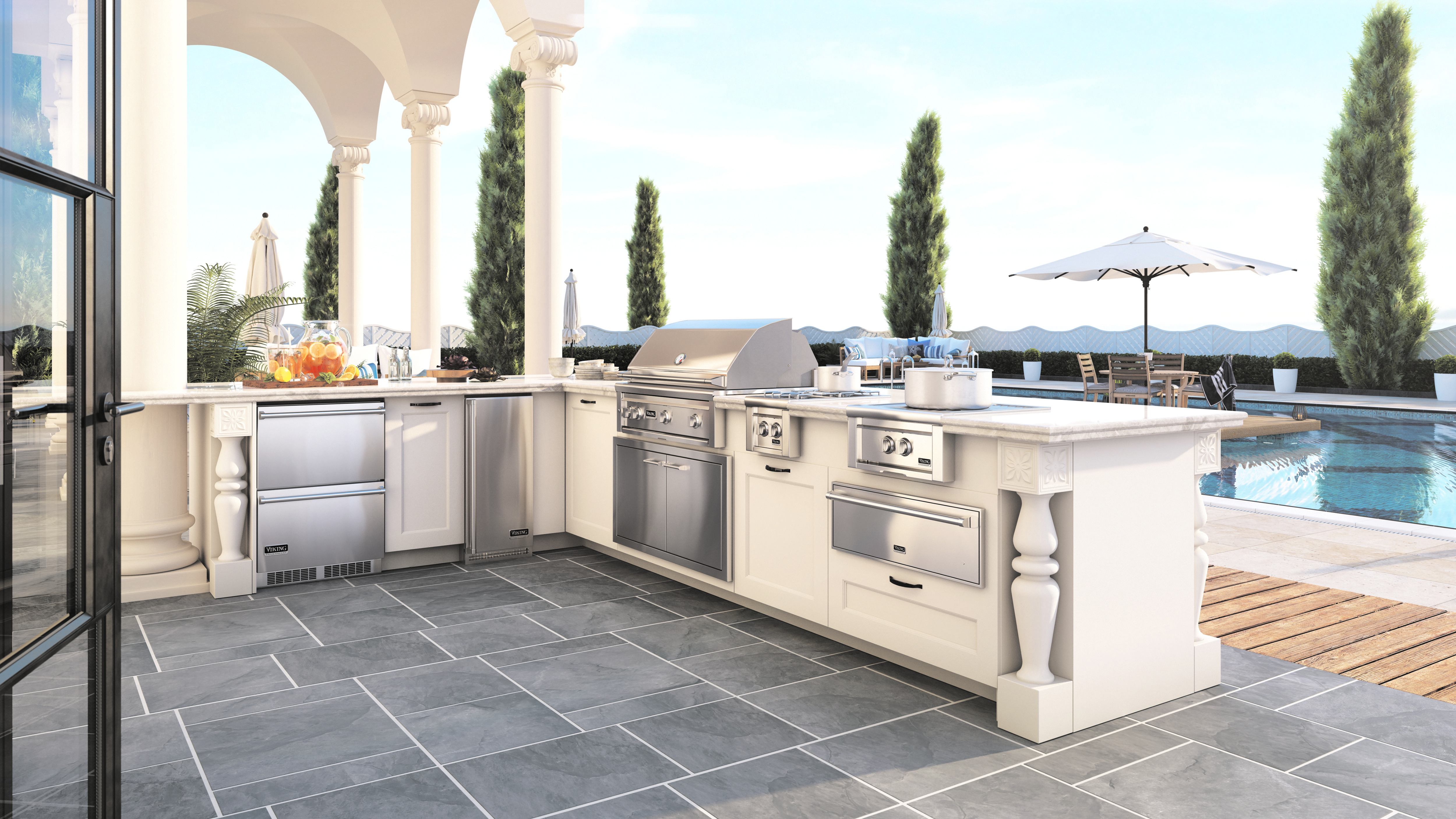 An outdoor kitchen featuring various Viking outdoor appliances 