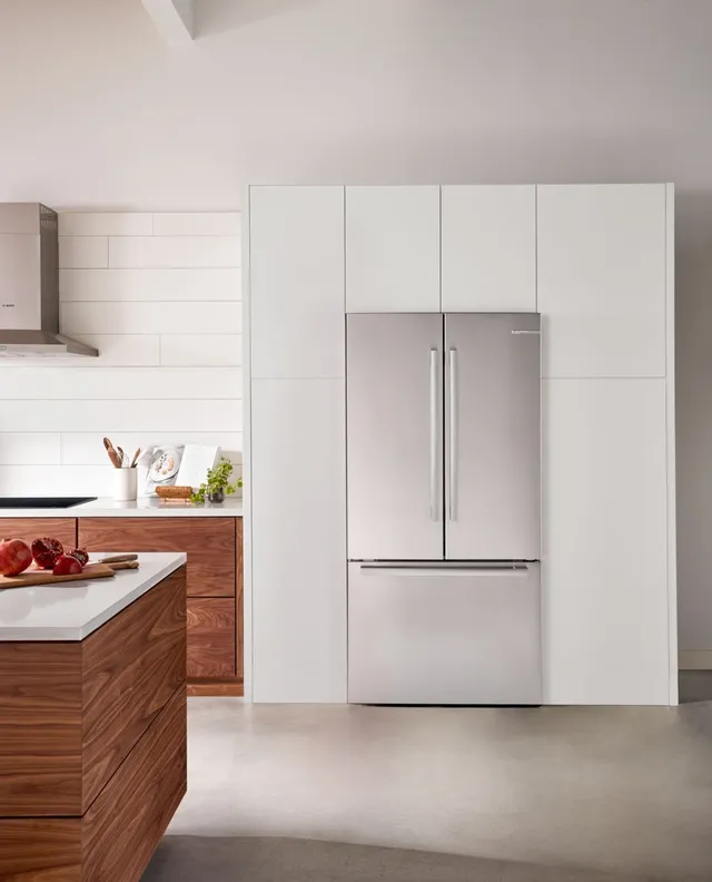 The Bosch 800 Series B36CT80SNS counter depth refrigerator in a kitchen 