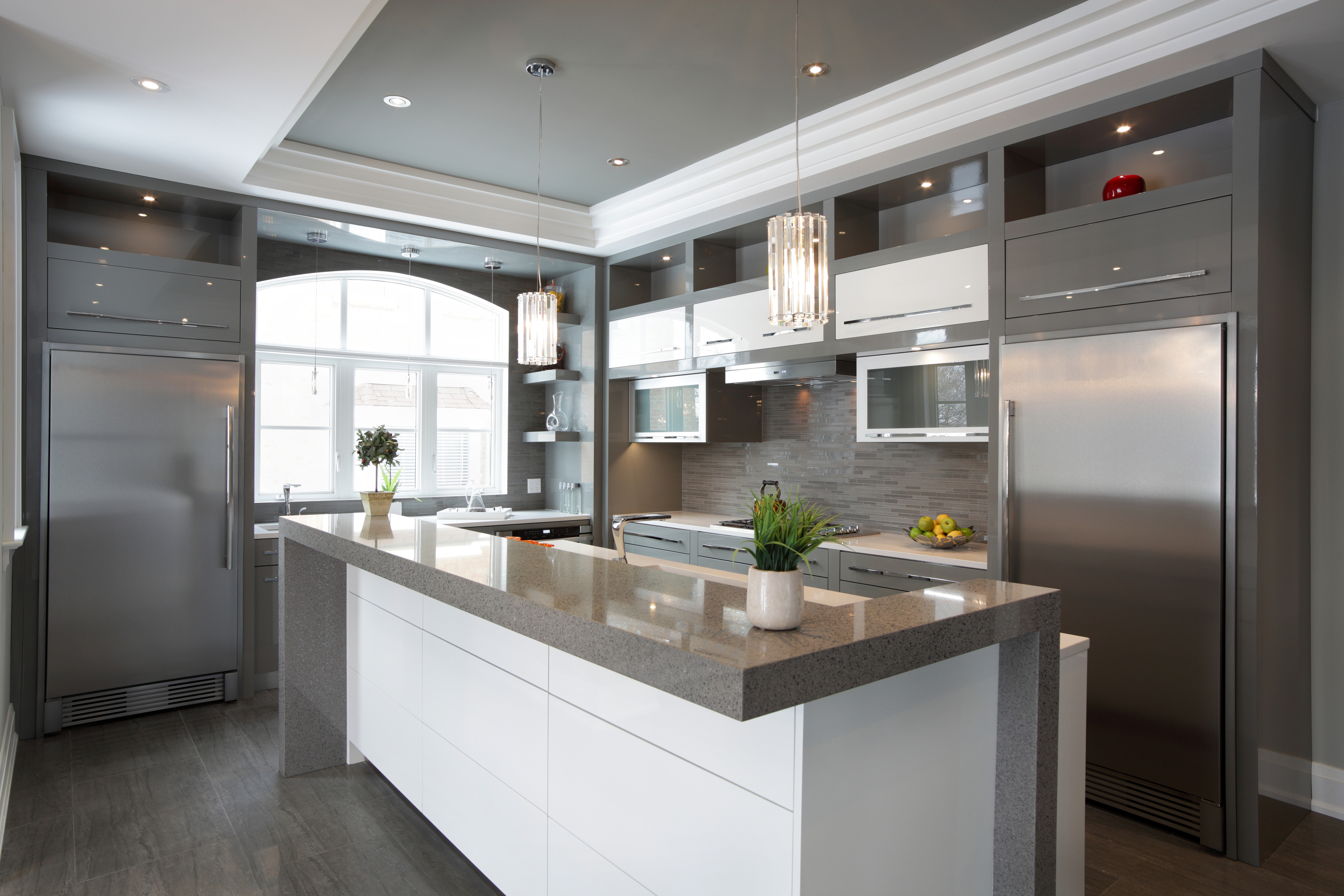luxury kitchen with separate stainless-steel built in column refrigerator and freezer