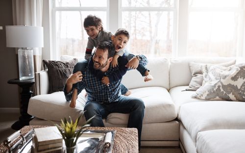 Father and Kids Playing in Living Room