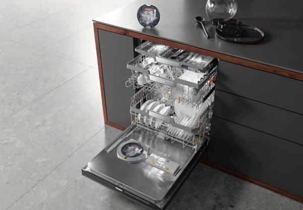 Overhead view of an open Miele dishwasher