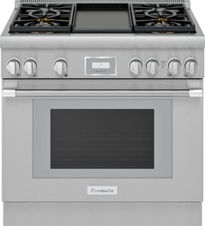 Stainless steel Thermador brand range with large handle and frontal digital controls.