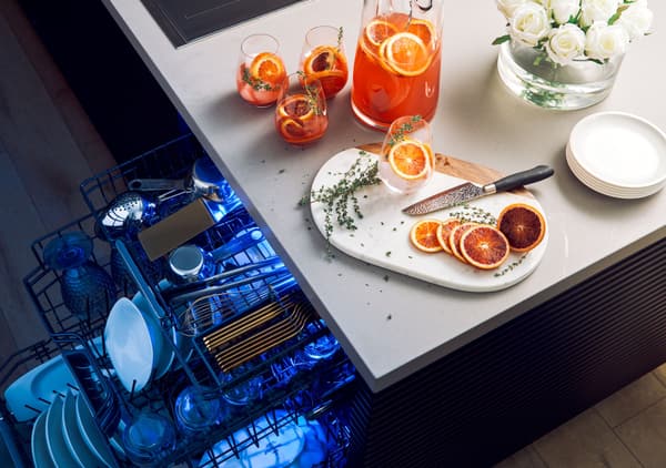 luxurious Thermador dishwasher with blue interior lighting